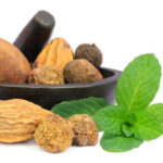 Triphala-a combination of ayurvedic fruits with mint leaves